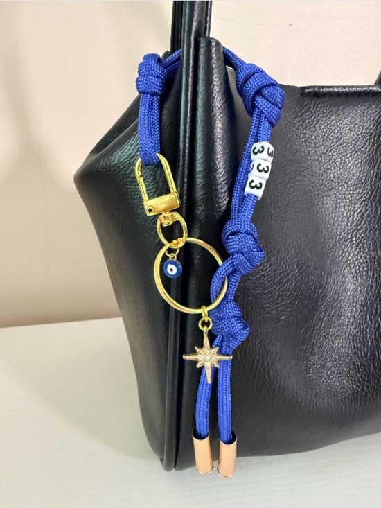 Accessories - NEW Blue Evil Eye 333 paracord bag charm key chain with North Star